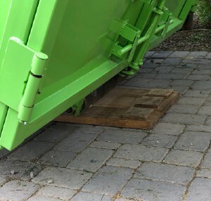 Protection Boards Under Dumpster Rentals